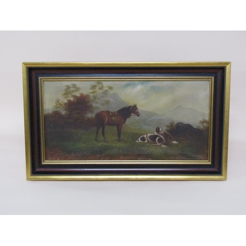 1268 - W Benion - A saddled horse and two dogs, signed oil on canvas, framed, 29cm x 59cm.