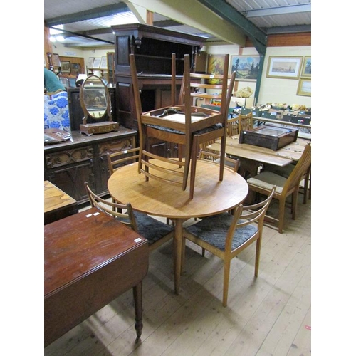 2033 - 1960/70s G PLAN CIRCULAR TEAK DINING TABLE TOGETHER WITH SIX LADDERBACK DINING CHAIRS