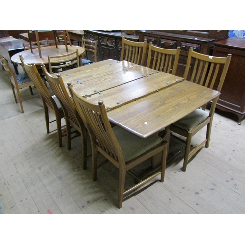 2034 - 1960s/70s ERCOL EXTENDING DINING TABLE TOGETHER WITH A SET OF SIX CHAIRS