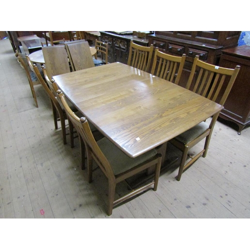 2034 - 1960s/70s ERCOL EXTENDING DINING TABLE TOGETHER WITH A SET OF SIX CHAIRS