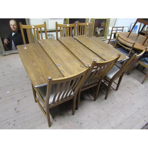 2034 - 1960s/70s ERCOL EXTENDING DINING TABLE TOGETHER WITH A SET OF SIX CHAIRS