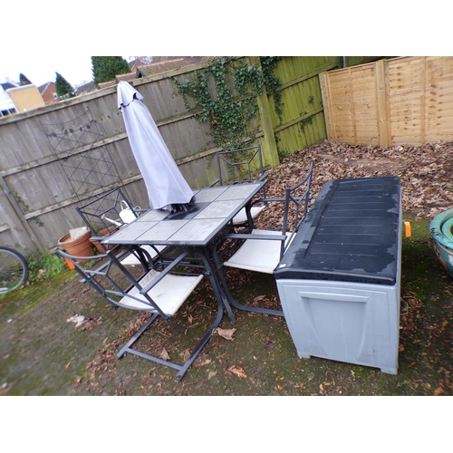 1035 - GARDEN TABLE AND FOUR CHAIRS PLUS PARASOL; STORAGE UNIT AND CUSHIONS