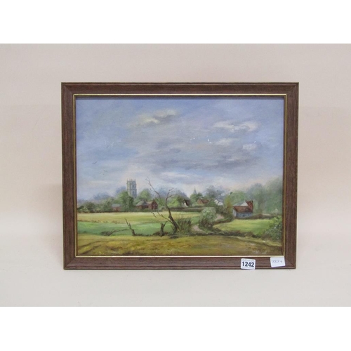 1242 - EMMETT - VILLAGE WITH CHURCH, OIL ON BOARD, FRAMED, 34CM X 45CM