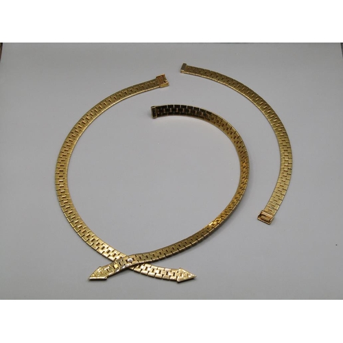 1624 - 9ct GOLD CROSSOVER NECKLACE AND MATCHING BRACLET 60.9g