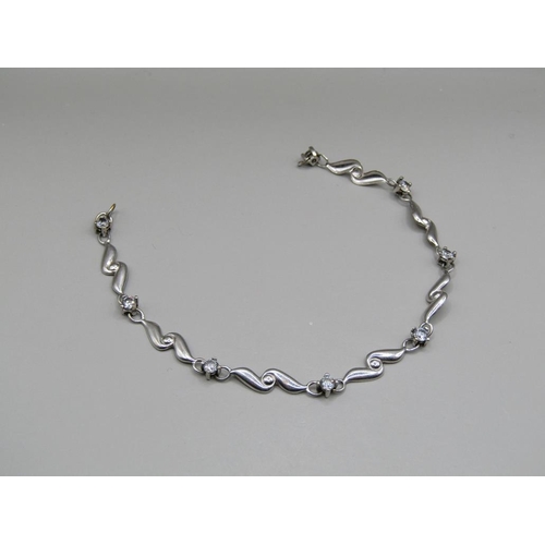 1638 - 9ct WHITE GOLD STONE SET BRACELET