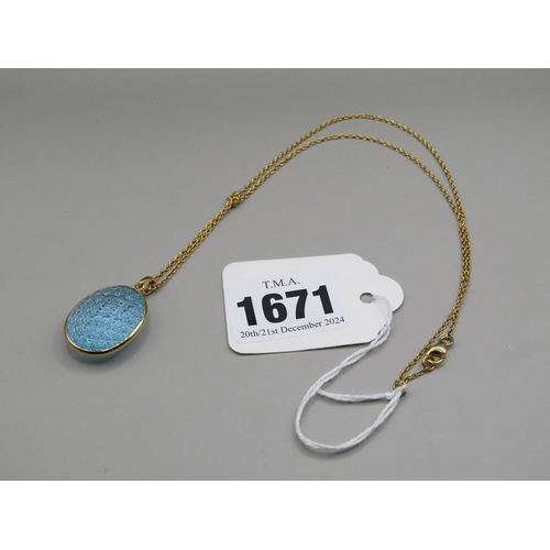 1671 - 18CT BLUE TOPAZ NECKLACE WITH SILVER GILT CHAIN