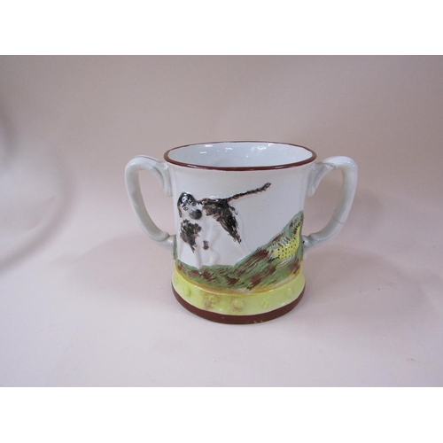 1910 - STAFFORDSHIRE TWO HANDLED FROG LOVING CUP, RELIEF MOULDED WITH HUNTING DOG SCENE, 15CM H, A/F