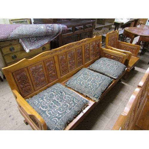 2045 - SUITE OF AFRICAN CARVED HARDWOOD COMPRISING TWO THREE SEATER SETTEES AND TWO ARMCHAIRS ALL WITH ANIM... 