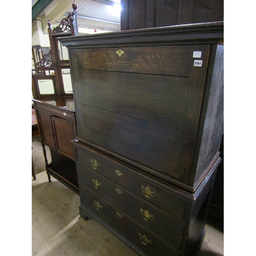 2061 - MID 18C OAK WRITING CABINET WITH FALL FRONT AND FITTED INTERIOR ON A BASE OF THREE LONG GRADUATED DR... 