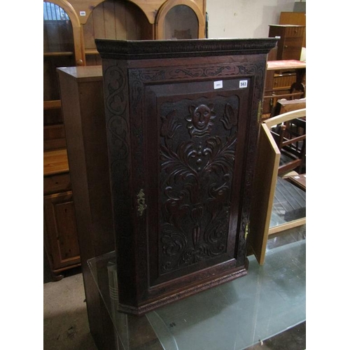 563 - OAK CARVED CORNER CUPBOARD