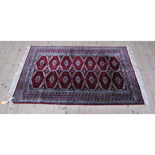 1665 - PERSIAN STYLE RED FAWN GROUND RUG - 90CM X 163CM