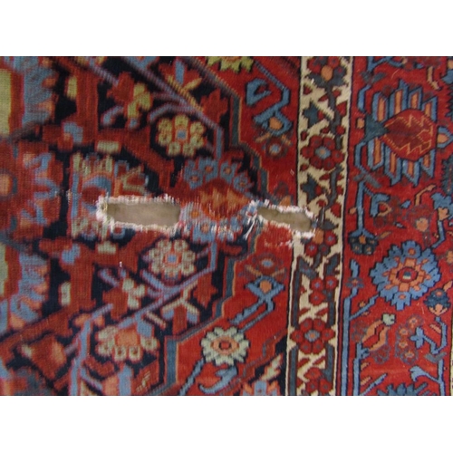 1673 - PERSIAN STYLE RUG OF FAWN AND RED GROUND WITH FLORAL PATTERNS, 136CM X 196CM