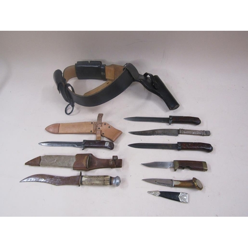 1396 - LEATHER HOLSTER AND BELT; SEVEN VARIOUS KNIVES AND BAYONETS