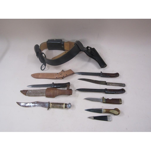 1396 - LEATHER HOLSTER AND BELT; SEVEN VARIOUS KNIVES AND BAYONETS