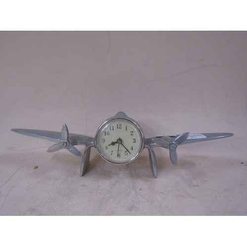 1490 - ALUMINIUM CONTRUCTED TWO ENGINE WINGED AIRCRAFT CLOCK, 34CM W