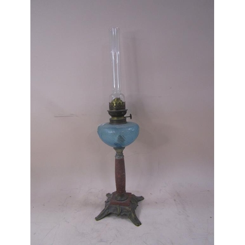 1497 - LATE 19C/EARLY 20C TABLE OIL LAMP WITH BRASS BASE AND COMPOSITE STONE COLUMN AND BLUE GLASS FONT, 44... 