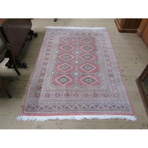 2029 - ORIENTAL PINK AND FAWN GROUND ORIENTAL RUG 190 x 132 cms