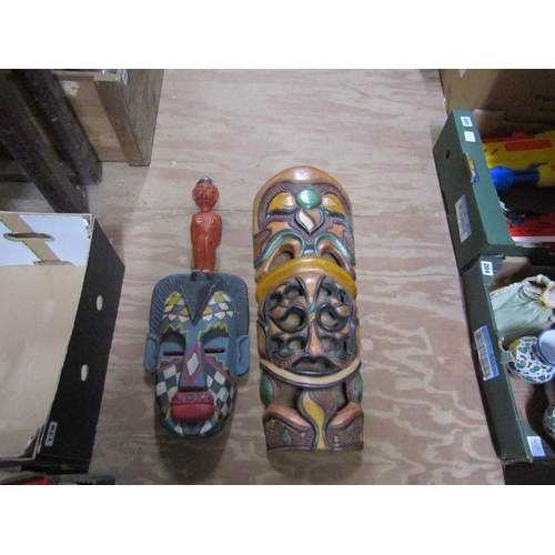 179 - CARVED PAINTED AFRICAN MASKS