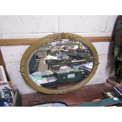 339 - GILT FRAMED OVAL BEVEL EDGE WALL MIRROR