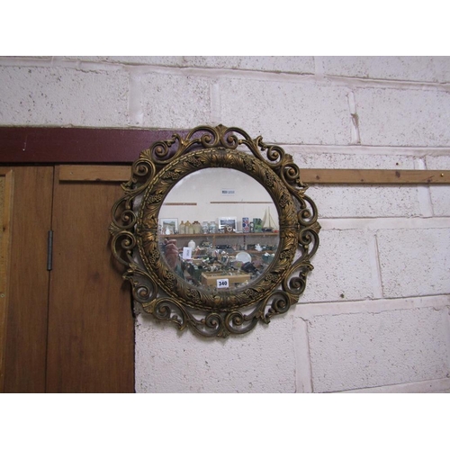 340 - GILT FRAMED OVAL WALL MIRROR