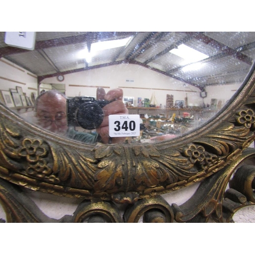 340 - GILT FRAMED OVAL WALL MIRROR