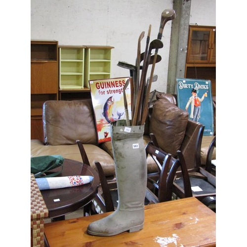 583 - BOOT STICK STAND CONTAINING GOLF CLUBS