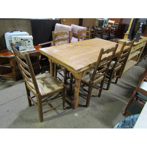 630 - OAK DRAWER LEAF DINING TABLE AND CHAIRS