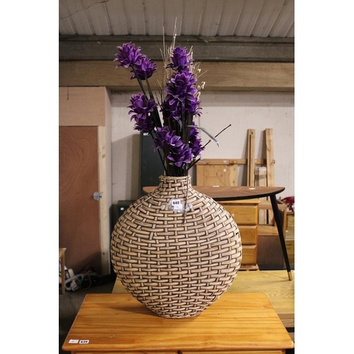 640 - LARGE WICKER VASE CONTAINING FLOWERS