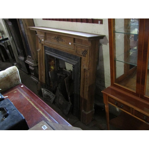 690 - CAST IRON FIREPLACE AND SURROUND