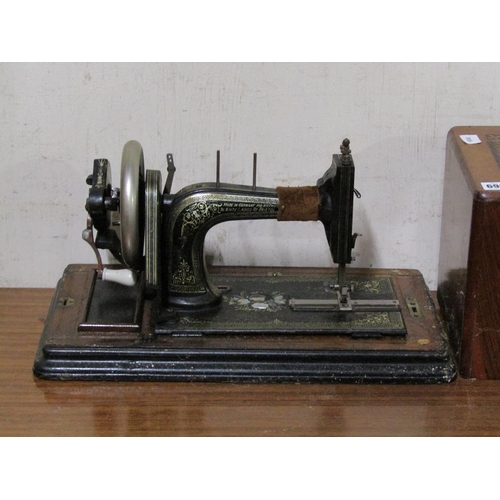 698 - VINTAGE SEWING MACHINE