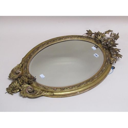 1260 - 19C GILT FRAMED AND STUCCO OVAL WALL MIRROR, 90CM X 54CM