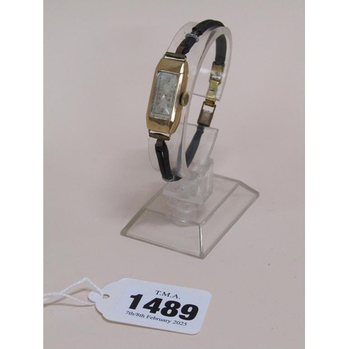 1489 - 9ct GOLD CASED LADIES WATCH