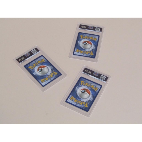 1518 - THREE POKEMON CARDS IN PSA PROTECTION PACKAGES