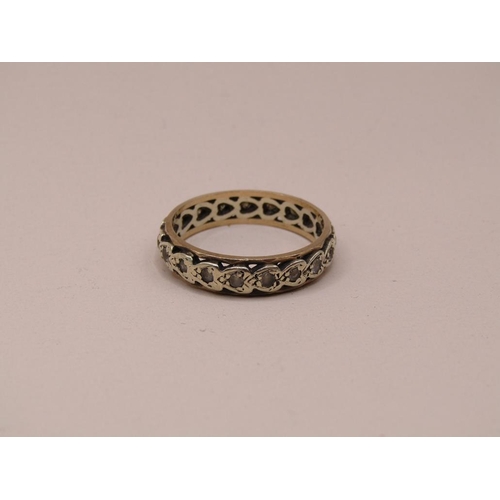 1562 - GOLD AND SILVER STONE SET ETERNITY RING SIZE Q