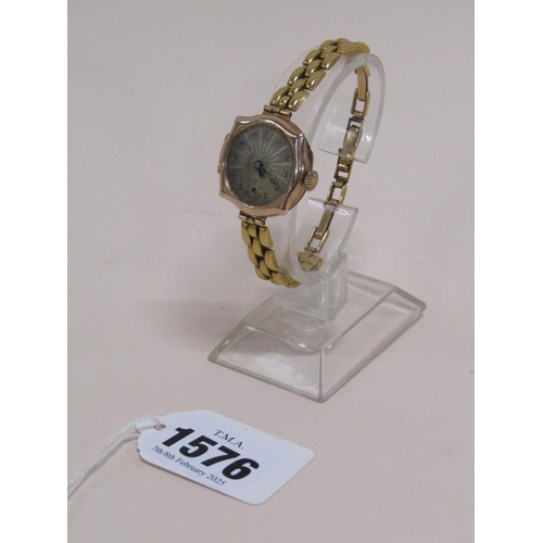 1576 - 9ct GOLD CASED WATCH ON GOLD PLATED STRAP