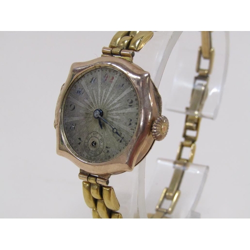 1576 - 9ct GOLD CASED WATCH ON GOLD PLATED STRAP