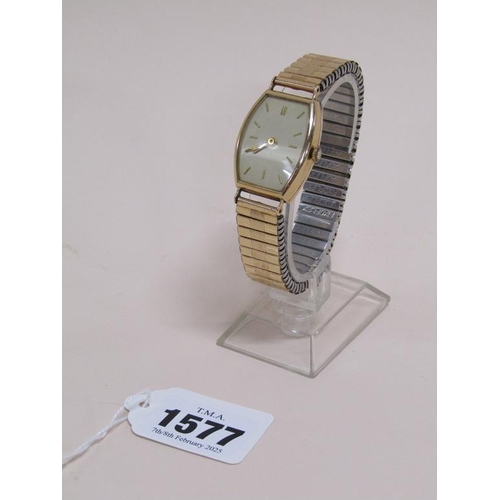 1577 - 14ct GOLD CASED WATCH ON EXPANDING PLATED STRAP