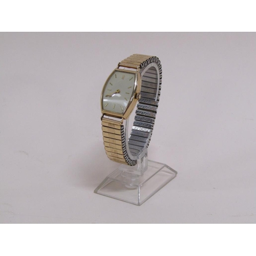 1577 - 14ct GOLD CASED WATCH ON EXPANDING PLATED STRAP