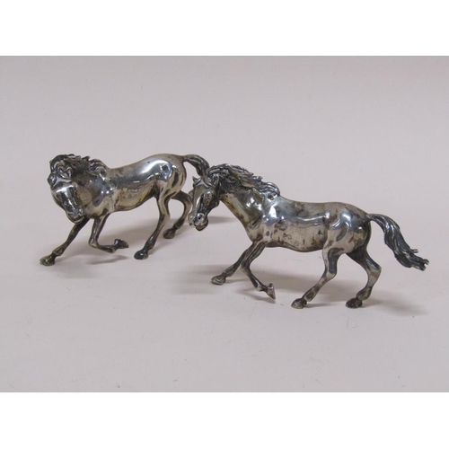 1595 - PAIR OF CONTINENTAL SILVER HORSES