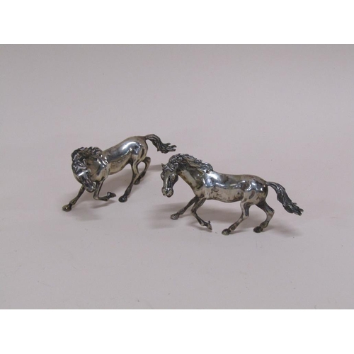 1595 - PAIR OF CONTINENTAL SILVER HORSES