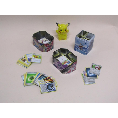 1645 - THREE TINS OF POKEMON CARDS AND PIKACHU