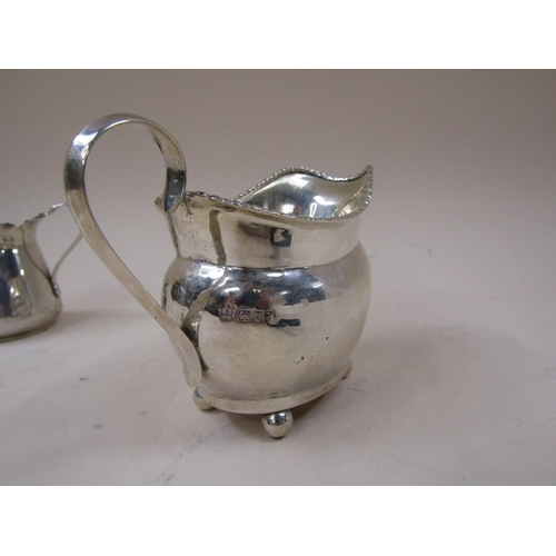 1709 - TWO SILVER CREAM JUGS 4.7ozt