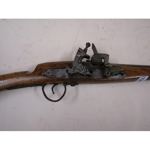 1388 - NORTH AFRICAN FLINT LOCK RIFLE, 136CM BARREL, 172CM L