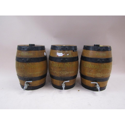 1421 - THREE SHERRY BARRELS, 35CM H