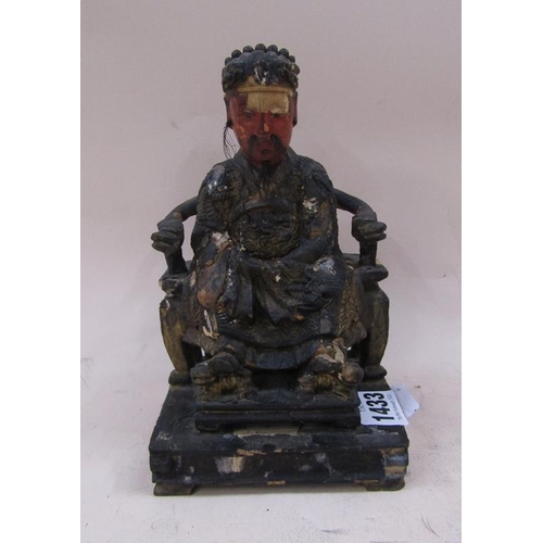 1433 - CARVED ORIENTAL FIGURE SITTING ON THRONE, 21CM H