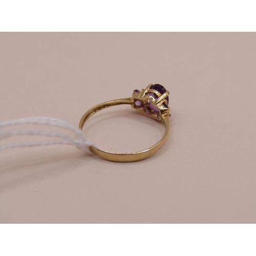 1611 - GOLD AMETHYST 3 STONE RING SIZE O