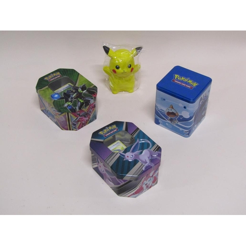 1645 - THREE TINS OF POKEMON CARDS AND PIKACHU