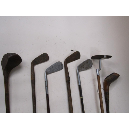 1409 - BUNDLE OF SEVEN MISC GOLF CLUBS