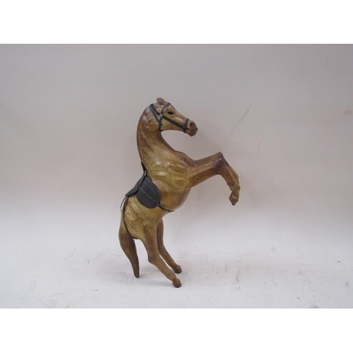 1446 - LEATHER COVERED FIGURE OF A SADDLED HORSE, 40CM L