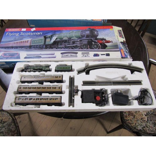 1310 - HOGWARTS EXPRESS ELECTRIC TRAIN SET; FLYING SCOTSMAN - IN ORIGINAL BOXES